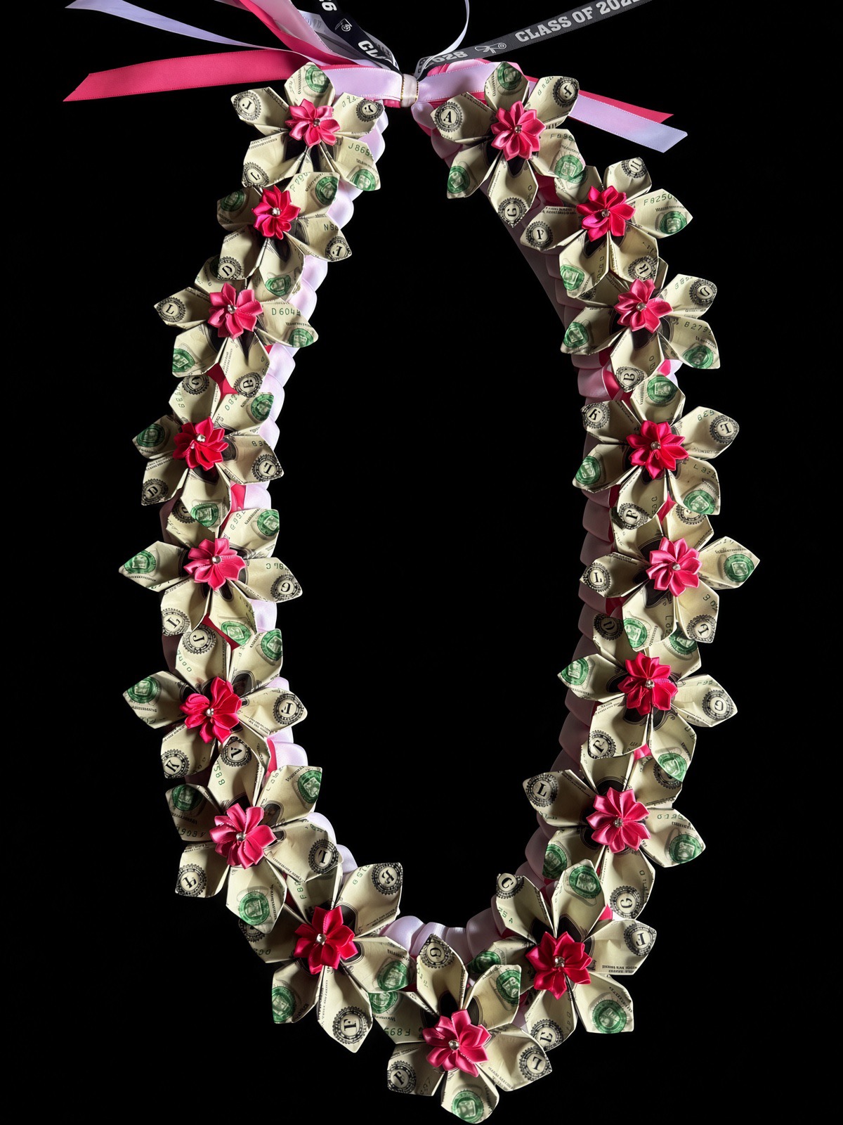 Pink money flower lei with Class of ribbons